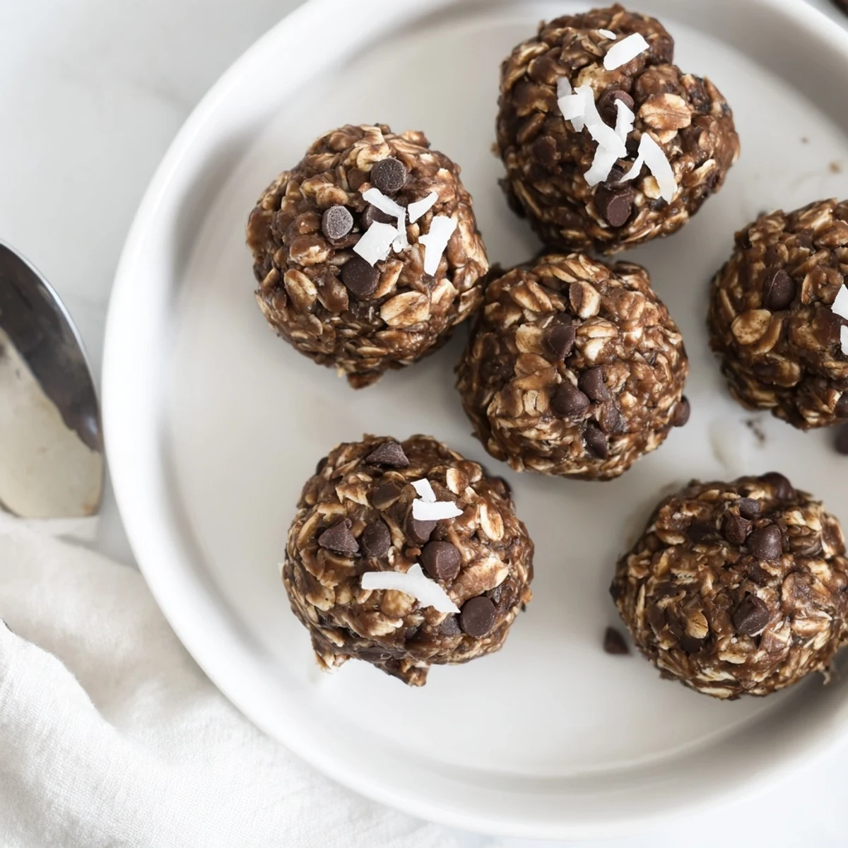 These vibrant Chocolate Peanut Butter Energy Balls look ready to savor, a perfect post-workout snack.