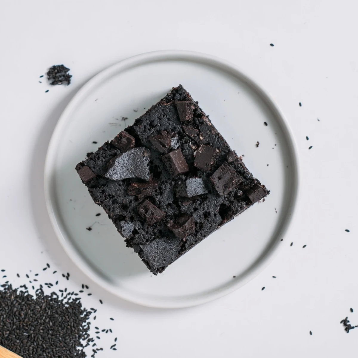 These fudgy Black Sesame Brownies feature a dark, crackly top and are studded with melted dark chocolate chunks.