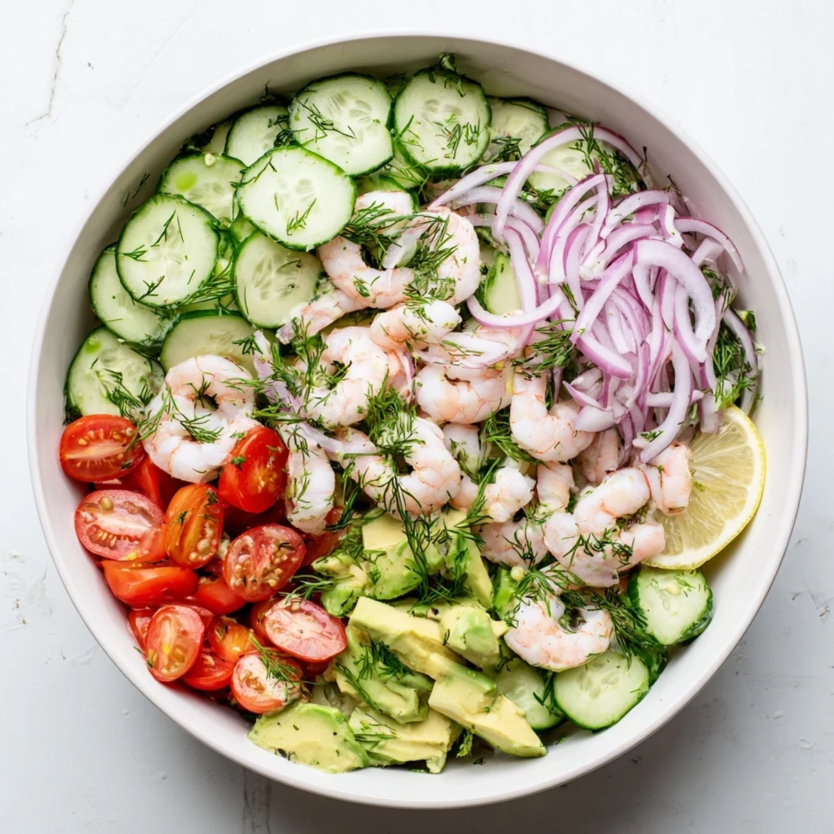 Fresh cucumber shrimp salad with tender shrimp, crisp vegetables, and zesty lemon-herb dressing