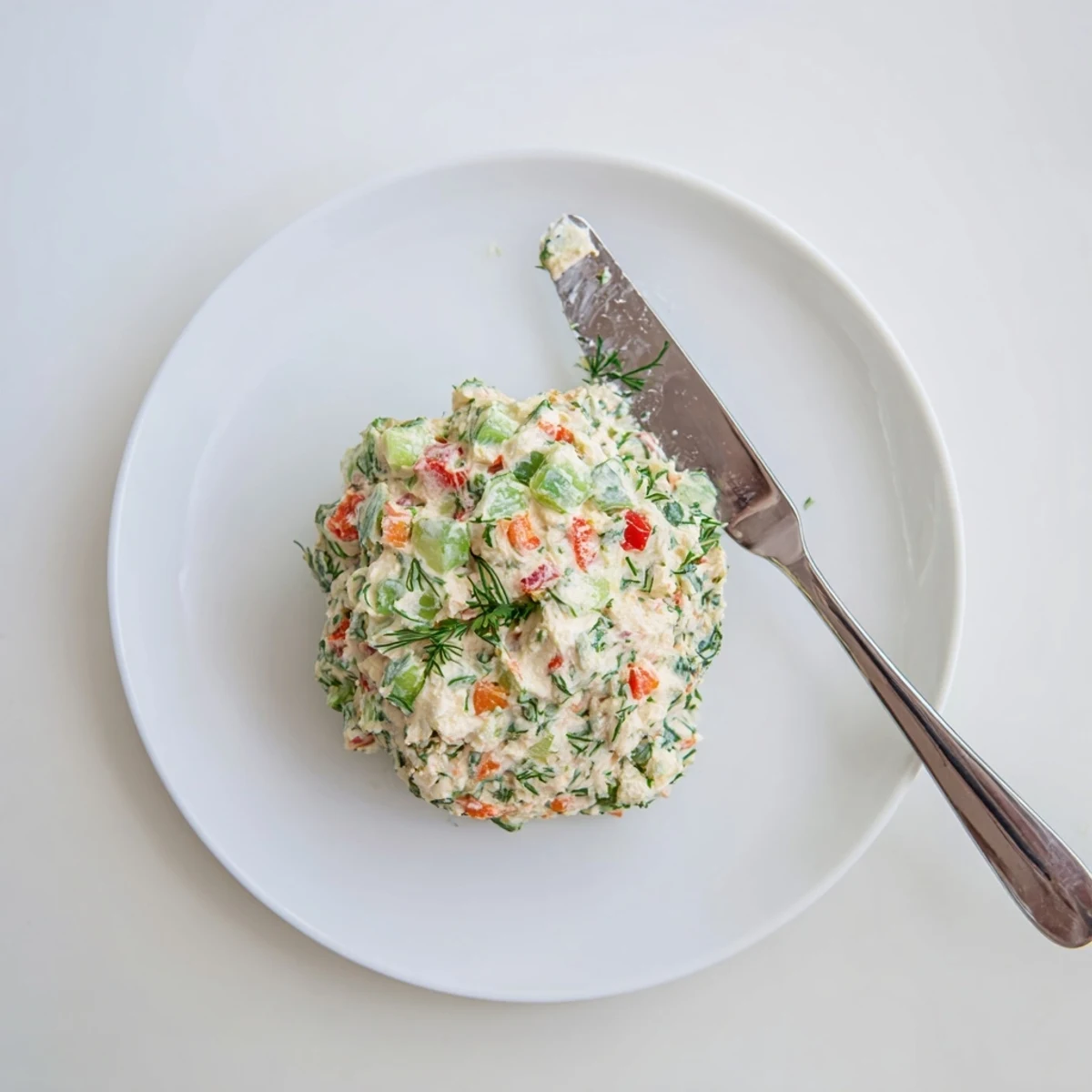 Garden Vegetable Spread Recipe chilled in bowl, creamy, herb-studded, crisp vegetables.